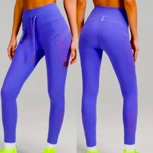 Brand new Lululemon Cargo SHR Hiking Tight 25" (Charged Indigo, Size 12)